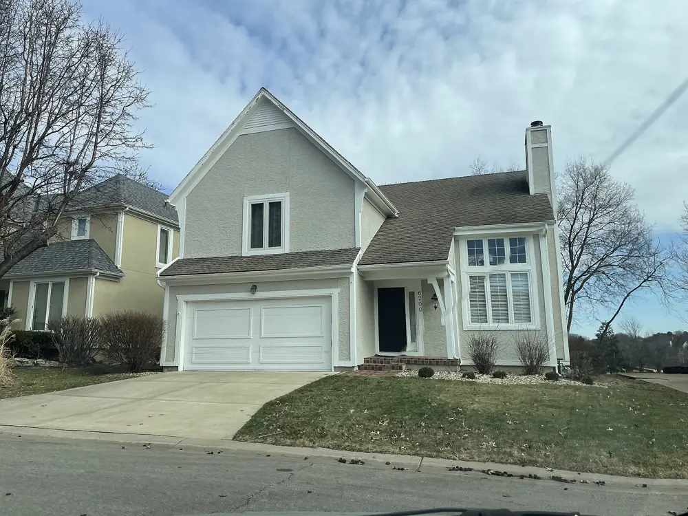A garage-forward suburban house in Overland Park, Kansas